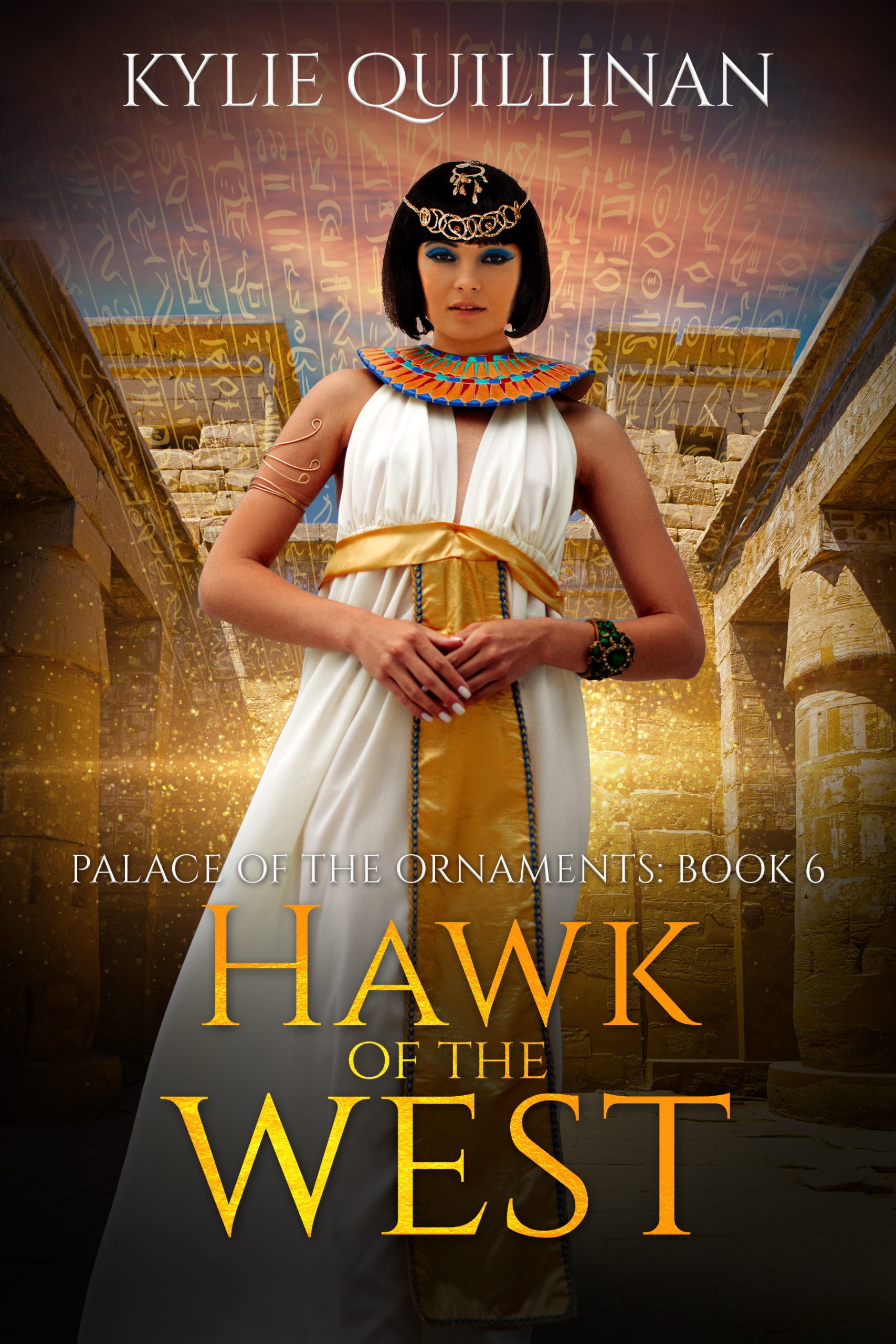 A woman wearing a white gown with a golden sash stands in the courtyard of a temple.